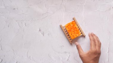 top view of men hand reaching for a soap .