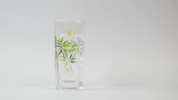 Hand Pick Glass Water White Background — 비디오