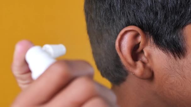 Close Men Using Spray Remove Earwax — Vídeo de Stock