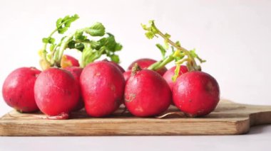 Fresh red radish bundle on table . High quality photo
