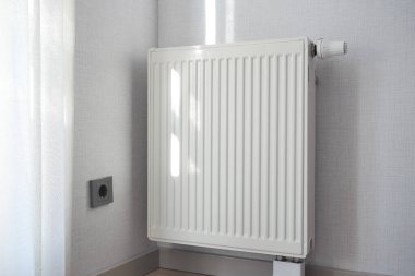 heating radiator under window in the room. High quality photo