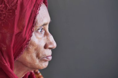 side view of thoughtful senior asian women face ,
