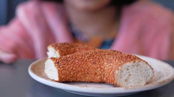 Child Hand Pick Fresh Bagel Bread — Video Stock
