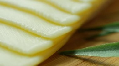 Mozzarella slice of cheese on wooden table ,