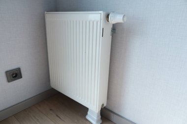 heating radiator under window in the room. High quality photo