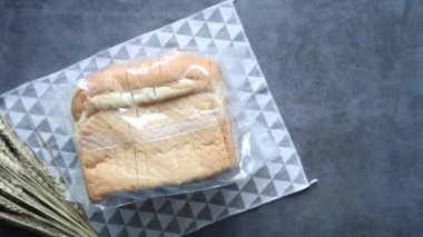  top view of baked bread in a plastic packet .
