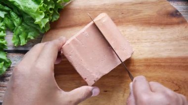 close up of canned meat on table ,