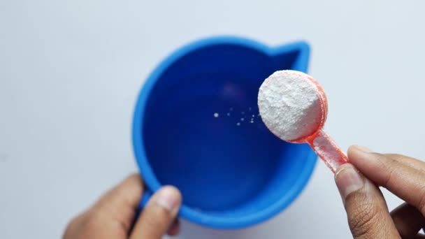 Washing Powder Plastic Spoon Blue Background — Stock Video