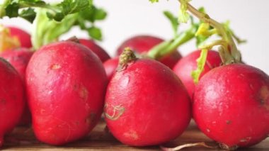 Fresh red radish bundle on table . High quality photo