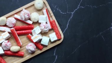close up of crab sticks on table .