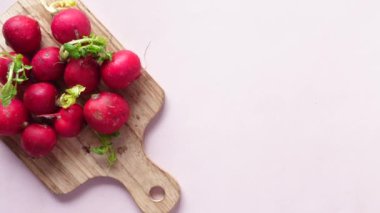 Fresh red radish bundle on table . High quality photo