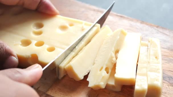 Sliced Cheese Holes Chopping Board Table — Vídeo de Stock