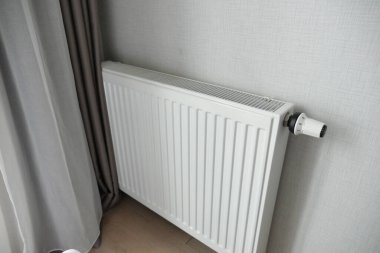 heating radiator under window in the room. High quality photo