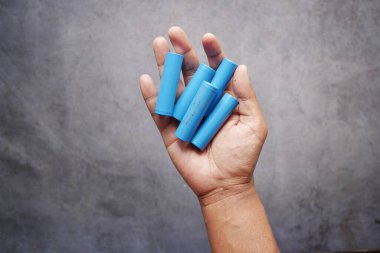 top view of Batteries on hand .