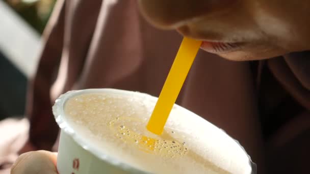 Woman Drink Juice Using Plastic Straw — Vídeos de Stock