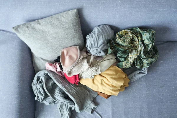 Messy Clothes Sofa — Foto Stock