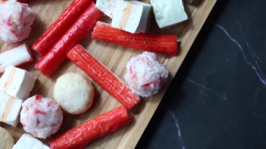 close up of crab sticks on table .
