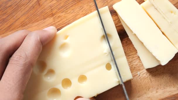 Sliced Cheese Holes Chopping Board Table — Stock videók