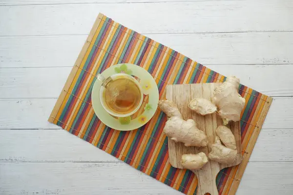 stock image Ginger tea on wooden background