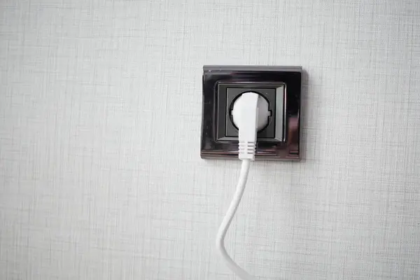 White Color Power Cord Cable Plugged Wall — 图库照片