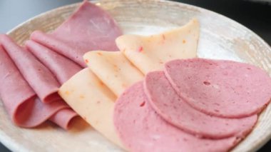 salami sausage cut into thin pieces .