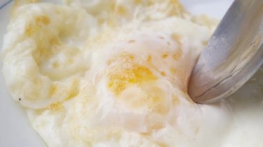 Fried eggs in the plate close up ,,