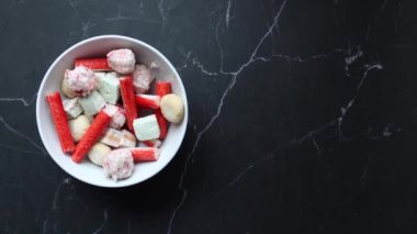 close up of crab sticks on table .