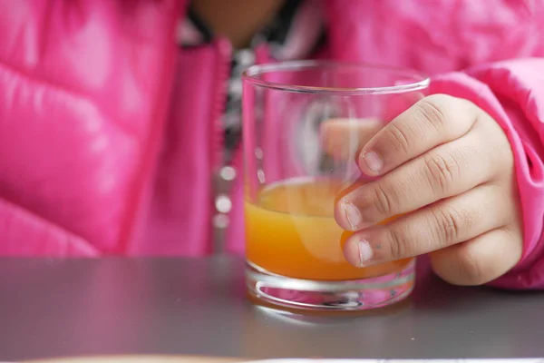 Child Holding Glass Orange Juice — Stock Photo, Image