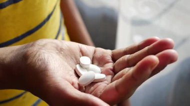 young men taking medical pill .