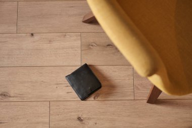 forget smartphone on floor at home .