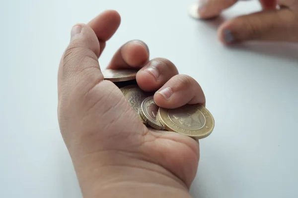 Child Holding Many Coins Close — Stock Photo, Image