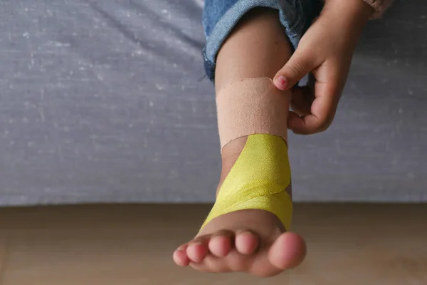 Adhesive Bandage Child Feet —  Fotos de Stock