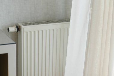 heating radiator under window in the room. High quality photo