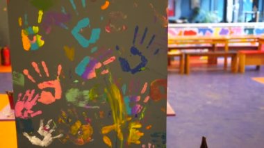 childrens hands marks on wall .