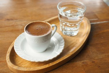 a cup of turkish coffee on table outdoor ,