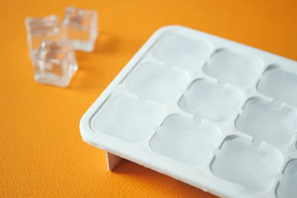 https://st5.depositphotos.com/32568146/65962/i/450/depositphotos_659625032-stock-photo-close-many-ice-cubes-white.jpg