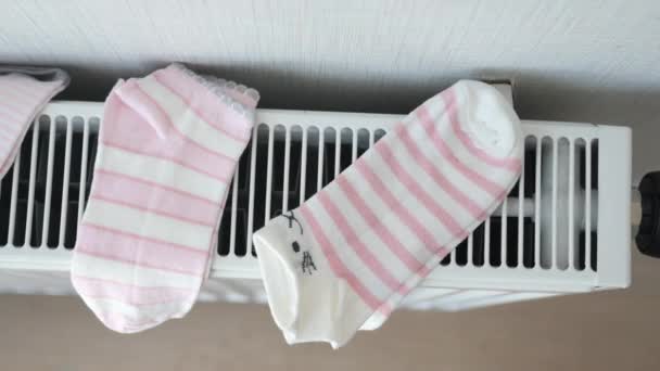 Child Sock Drying Heating Radiator — Stock Video