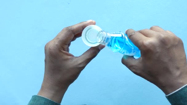 Hand Hold Mouthwash Liquid Container — Stock Video