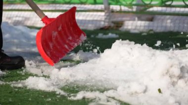 men using Red blurry snow shovel