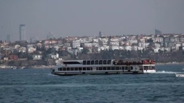 ferryboat sail on the Bosphorus river in istanbul .