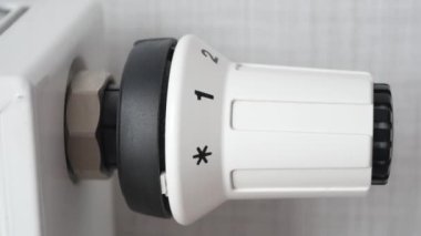 changing temperature on heating radiator .