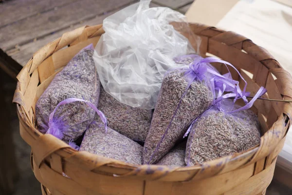 stock image Pouch with lavender in a wooden basket