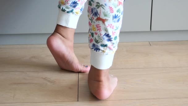 Low Angle View Child Walking Tiptoes — Vídeos de Stock