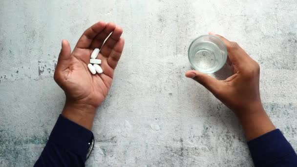 Young Men Taking Medical Pill — Video