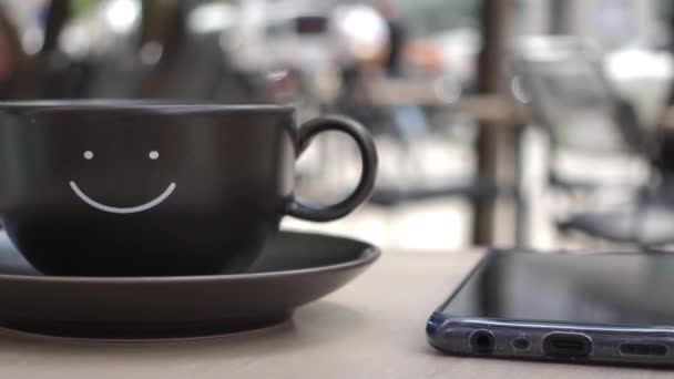 Чорна Чашка Кави Дизайном Форми Посмішки Ньому — стокове відео
