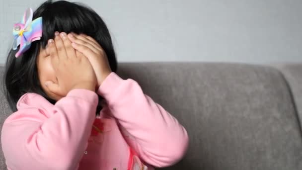 Upset Child Girl Cover Her Face Hand — Stok video