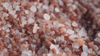 Raw dried pink Himalayan salt .