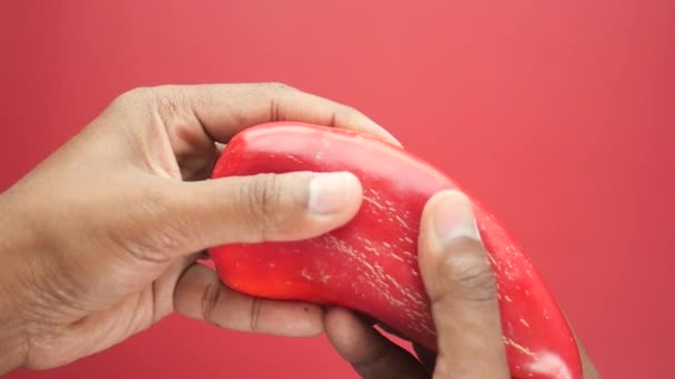 Slow Motion Hand Breaking Red Capsicum — Stock Video