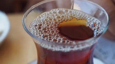 Traditional turkish tea on white table 