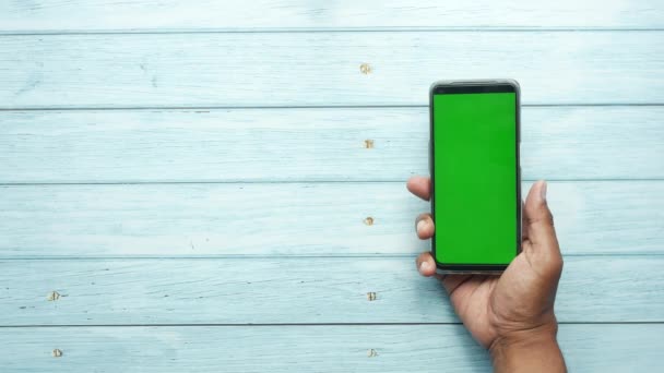 Top View Young Man Hand Using Smart Phone Green Screen — Vídeo de Stock